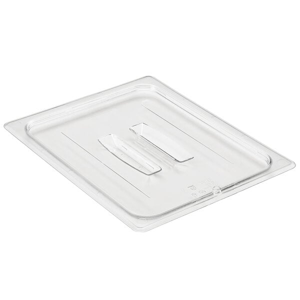A clear plastic lid with a handle on it.