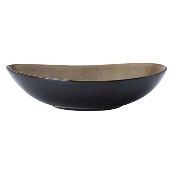A black porcelain soup bowl with a brown rim.