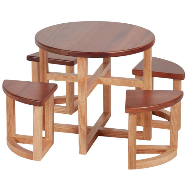 A wood countertop table riser with stools on a table.
