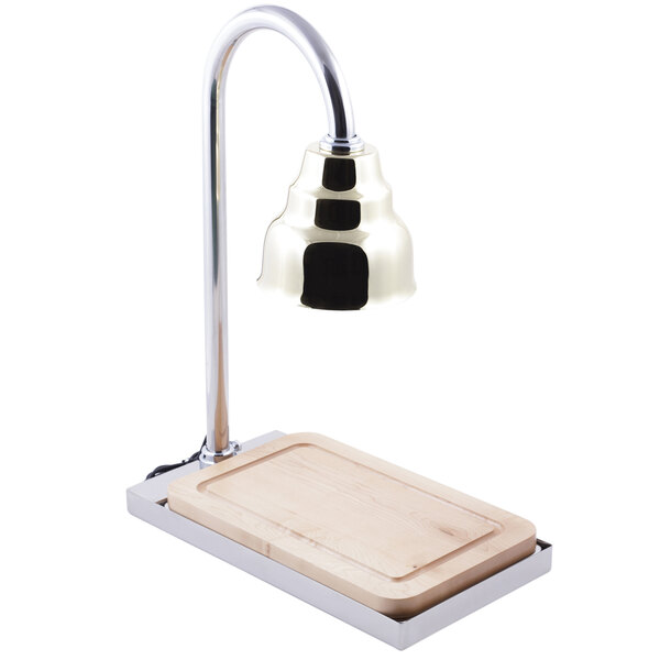 A Bon Chef carving station with a brass lamp and butcher block.