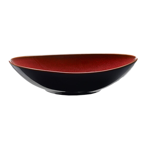 A red and black Oneida Rustic porcelain soup bowl.