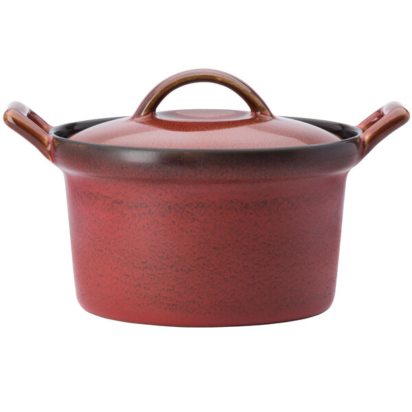 A Oneida crimson porcelain casserole dish with a lid and handle.