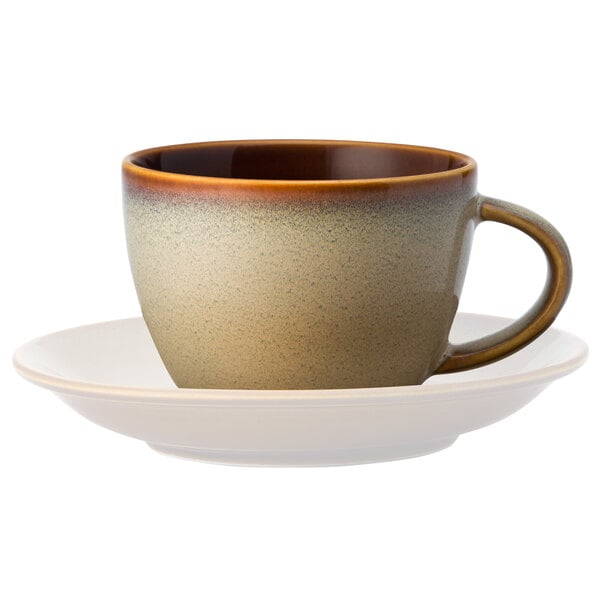 A brown and white Oneida Rustic Sama porcelain coffee cup and saucer.