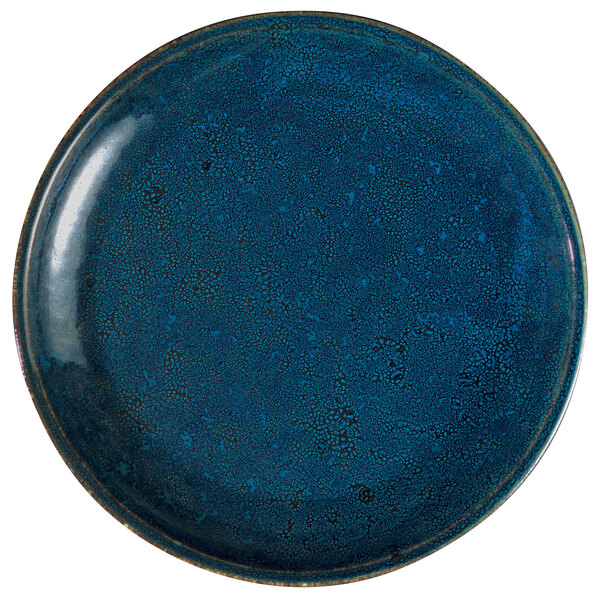 A white porcelain round deep plate with blue moss speckles and a black rim.