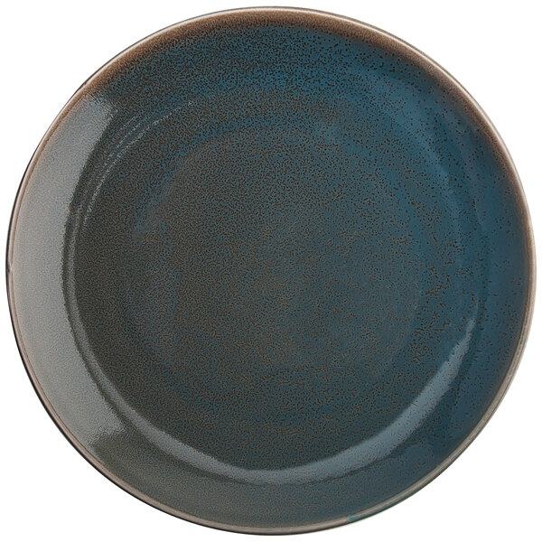 An Oneida Terra Verde Dusk porcelain round plate with a dark blue center and brown rim.