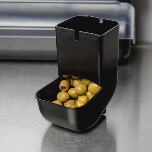 A black rectangular Tablecraft replacement insert with green olives inside.