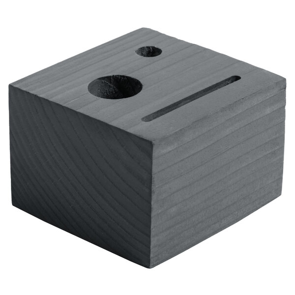 A black customizable ash wood block check presenter with a hole in the face.