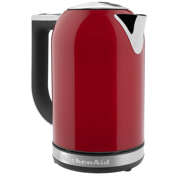 A red and black KitchenAid electric kettle with stainless steel accents.