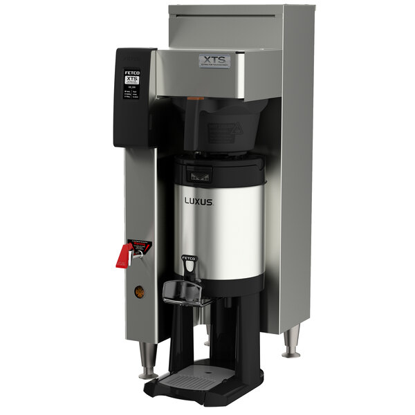A Fetco stainless steel automatic coffee brewer with black accents.