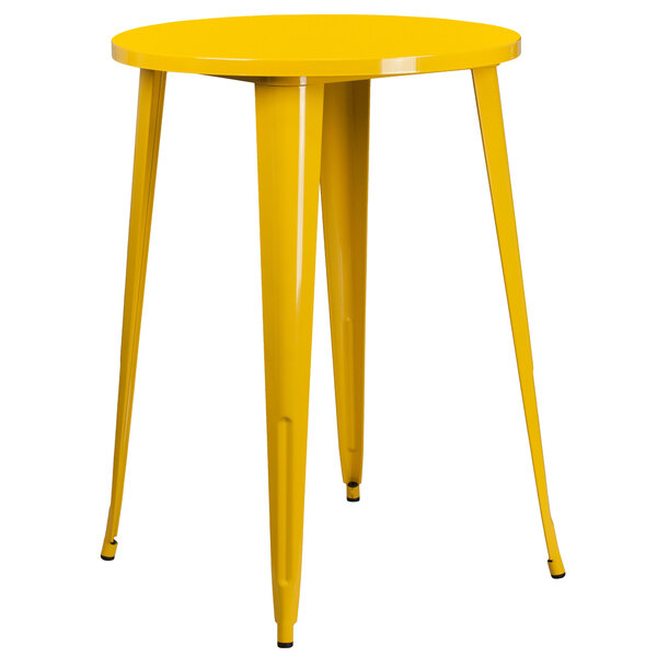 A yellow metal table with legs.