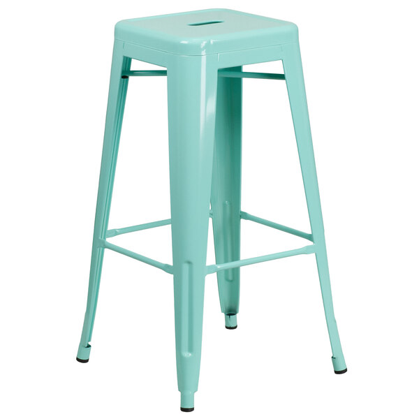 A Flash Furniture mint green metal backless bar stool with a square seat.