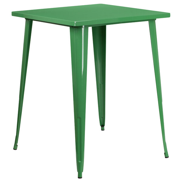 A green Flash Furniture metal bar height table with four legs.