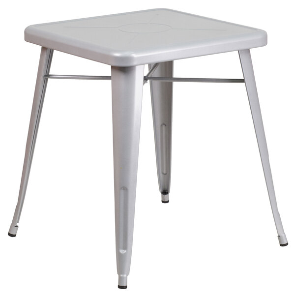 A square silver metal table with legs.