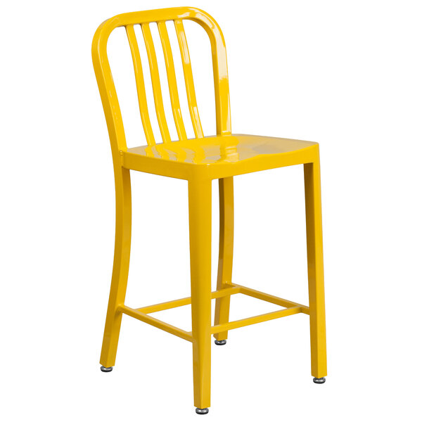 A yellow Flash Furniture metal counter height stool with vertical slat back.
