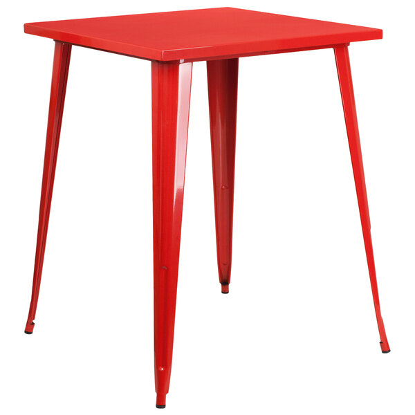 A red square Flash Furniture metal table with legs.