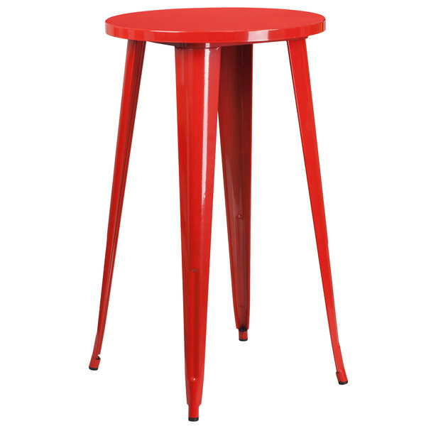 A red round table with legs.