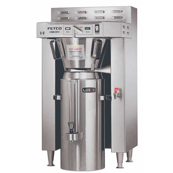 A Fetco CBS-61H commercial automatic coffee brewer with stainless steel accents.