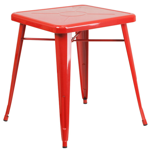 A Flash Furniture red metal table with legs.
