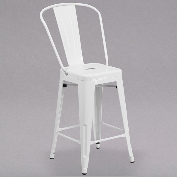 A white metal Flash Furniture counter height stool with a vertical slat back and drain hole seat.