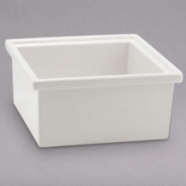A white plastic container with a square white top.
