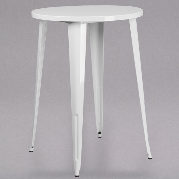 A white round Flash Furniture bar height table with white metal legs.