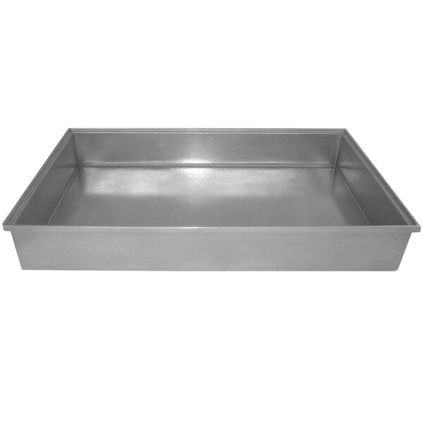 A rectangular silver metal Bon Chef food pan on a white counter.