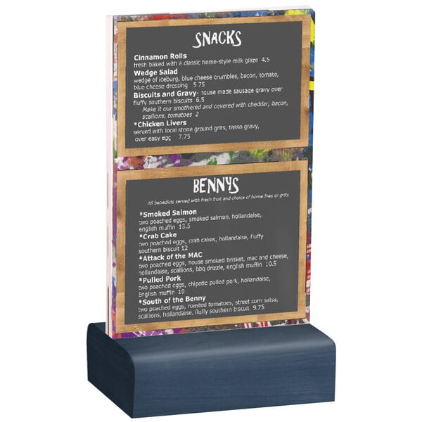 A Menu Solutions clear acrylic table tent with a solid wood base holding a menu on a table.