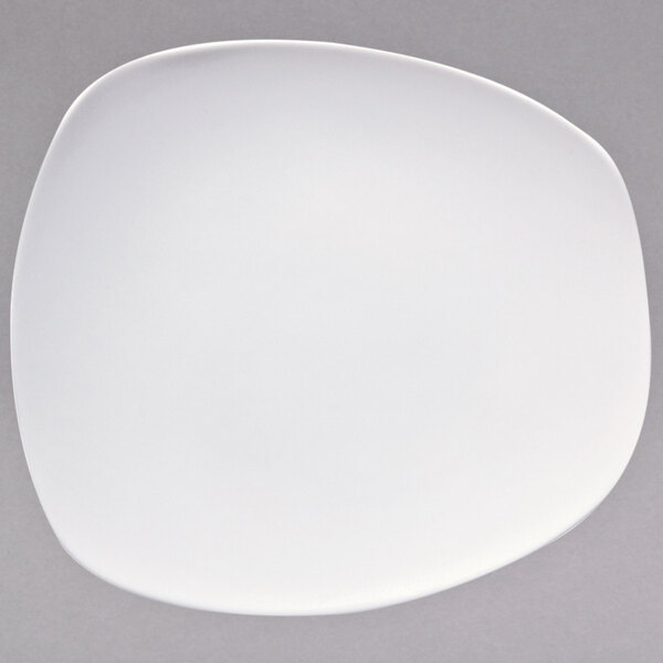 A warm white porcelain plate with a circular shape.