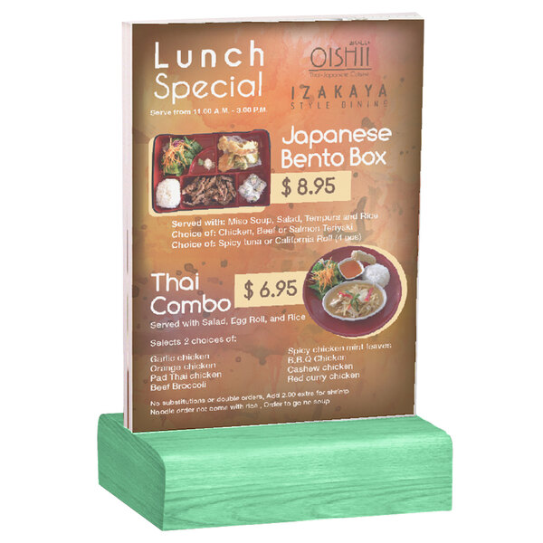 A Menu Solutions clear acrylic table tent with a solid teal wood base holding a menu.