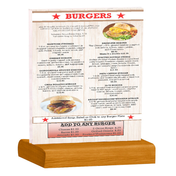 A Menu Solutions clear acrylic table tent with solid country oak wood base holding a menu for burgers on a table.