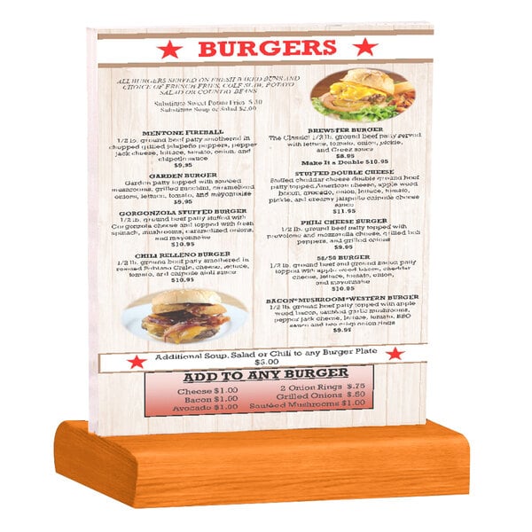 A Menu Solutions clear acrylic table tent on a solid wood stand holding a menu for burgers.