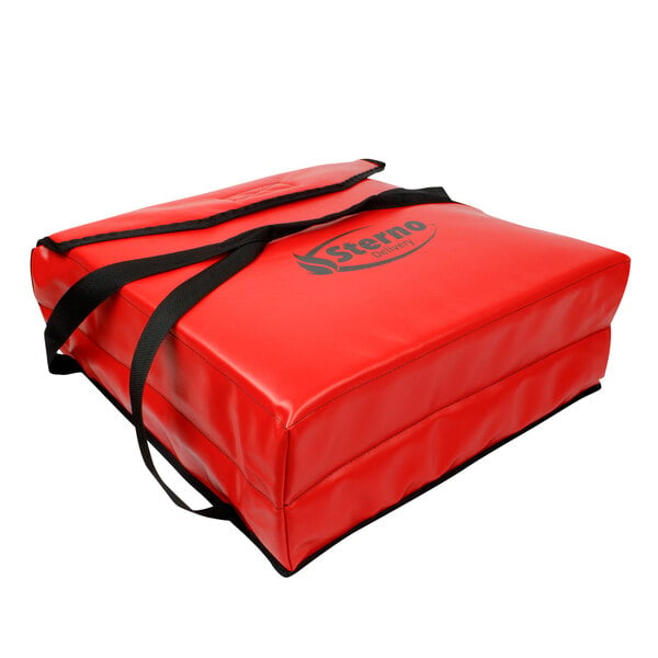 A red Sterno insulated vinyl delivery bag with black straps.