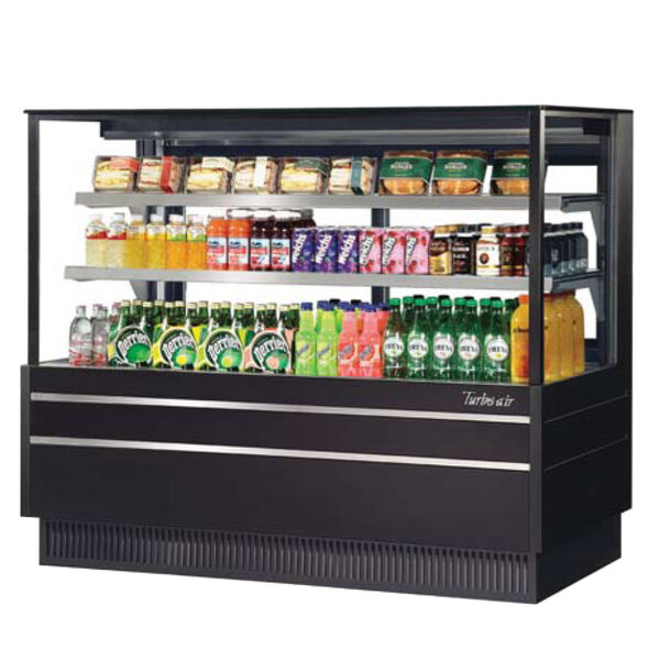 A Turbo Air black refrigerated bakery display case with drinks and beverages inside.