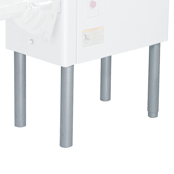 A white box with four metal legs.