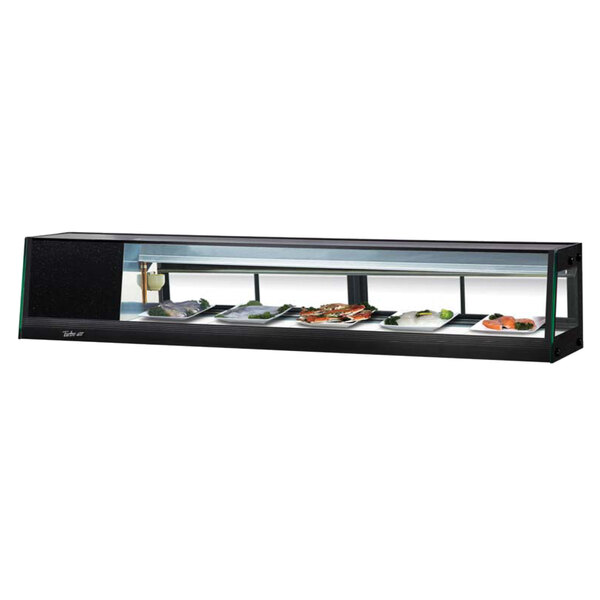 A Turbo Air refrigerated sushi case with plates of food on display.