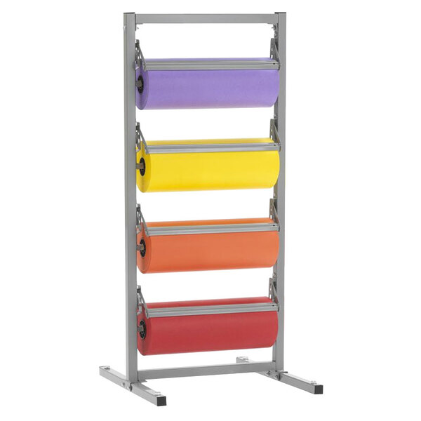 A Bulman metal tower rack with four paper rolls on it.