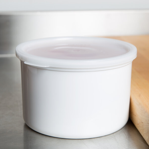 A white Cambro crock with a plastic lid.