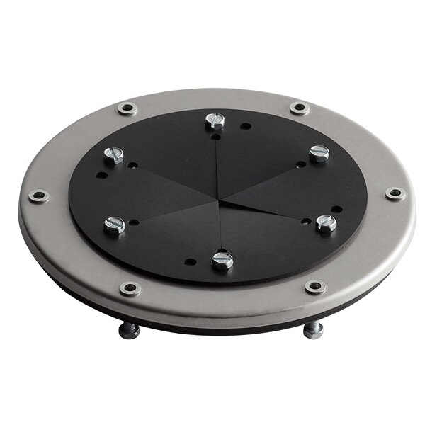 A black and silver circular adapter plate with holes for screws.