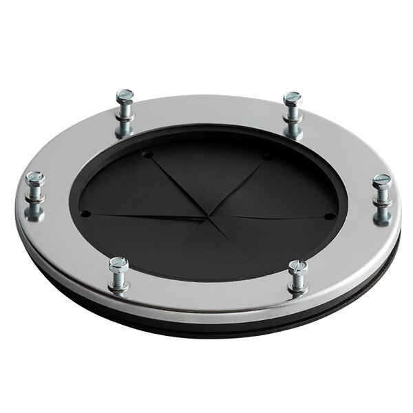 A black and silver circular InSinkErator disposer adapter plate with screws.