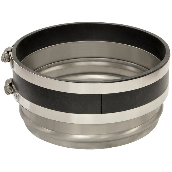 A round metal Salvajor disposer adapter with black and silver metal stripes.
