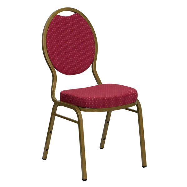 A red banquet chair with a gold frame.
