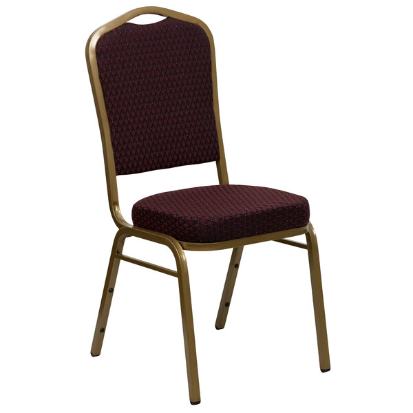 A Flash Furniture burgundy banquet chair with a gold frame and crown back with a red cushion.