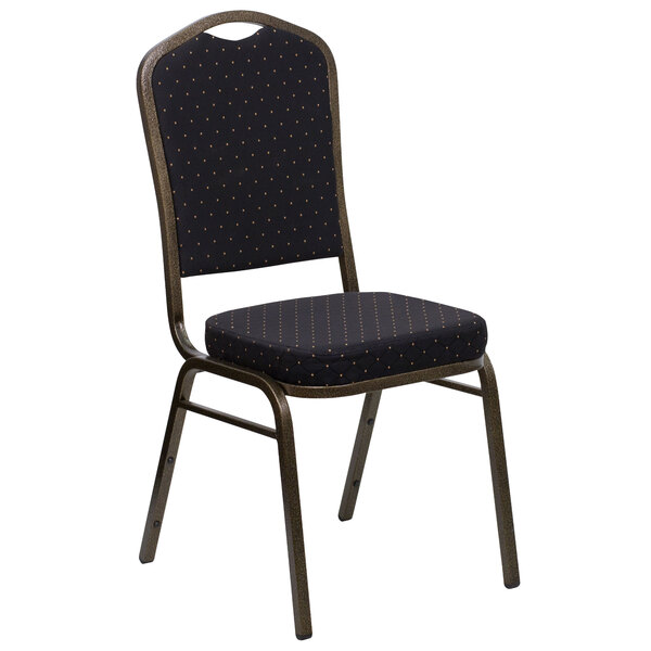 A black banquet chair with gold dots on the back.