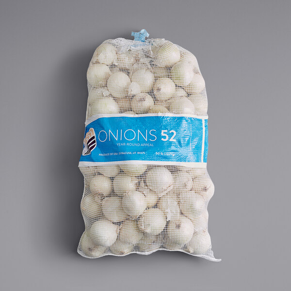 A blue and white net bag of Jumbo White Onions.