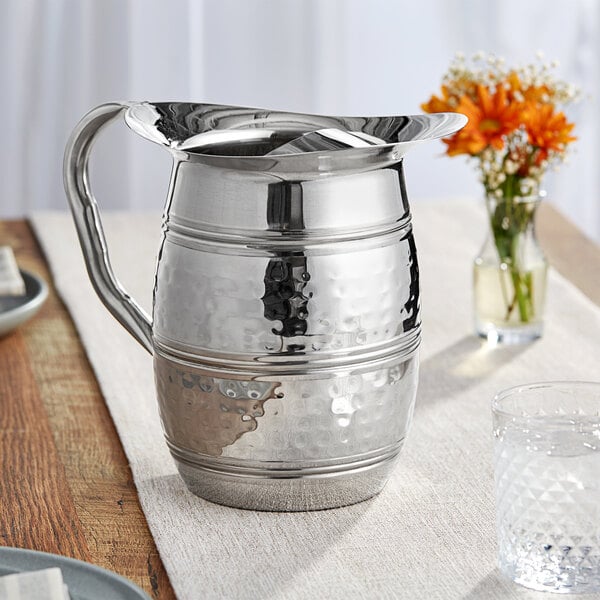 Acopa 96 oz. Hammered Stainless Steel Bell Pitcher with Ice Guard