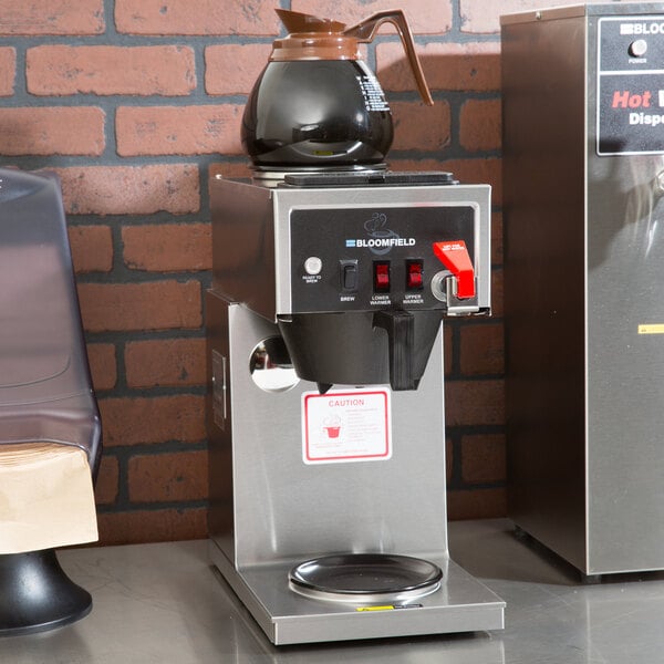 A Bloomfield Koffee King automatic coffee maker on a counter.
