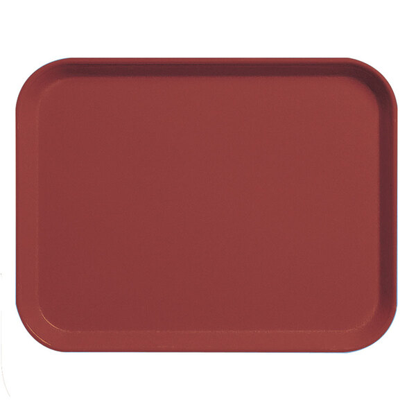 A red Cambro Camlite serving tray on a counter.