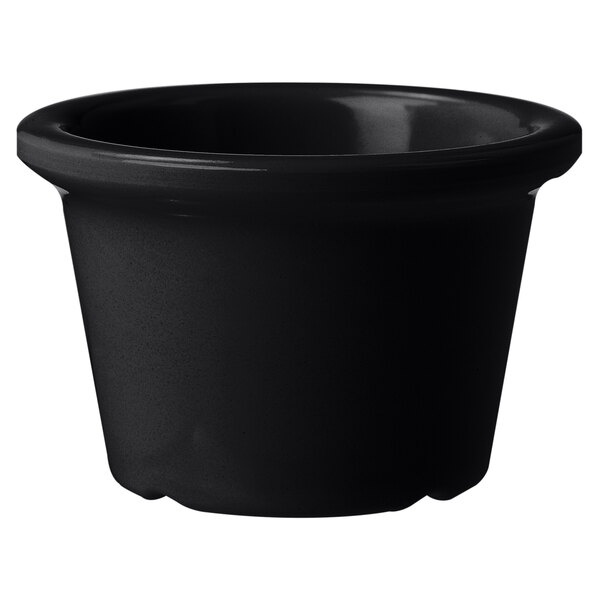 A black round object with a white background.
