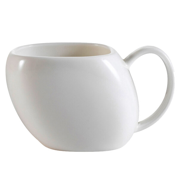 A CAC white porcelain coffee cup with a handle.