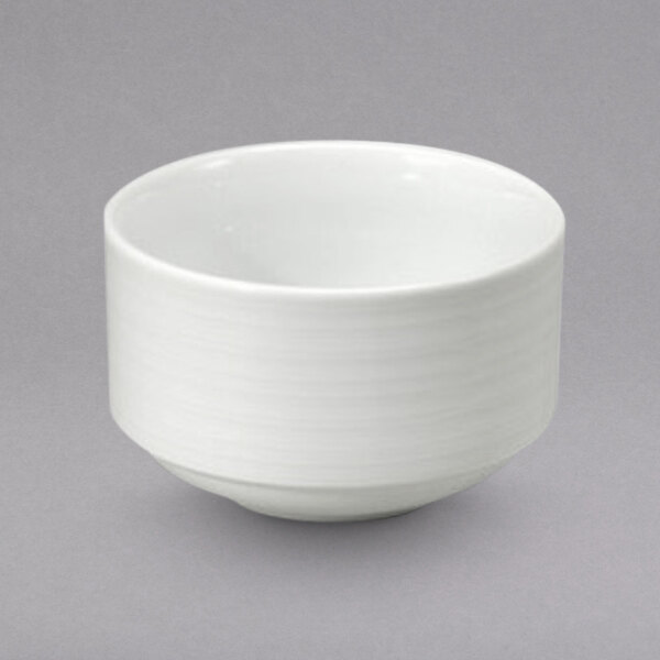 A close up of a Oneida Botticelli bright white porcelain bouillon cup with a small rim.